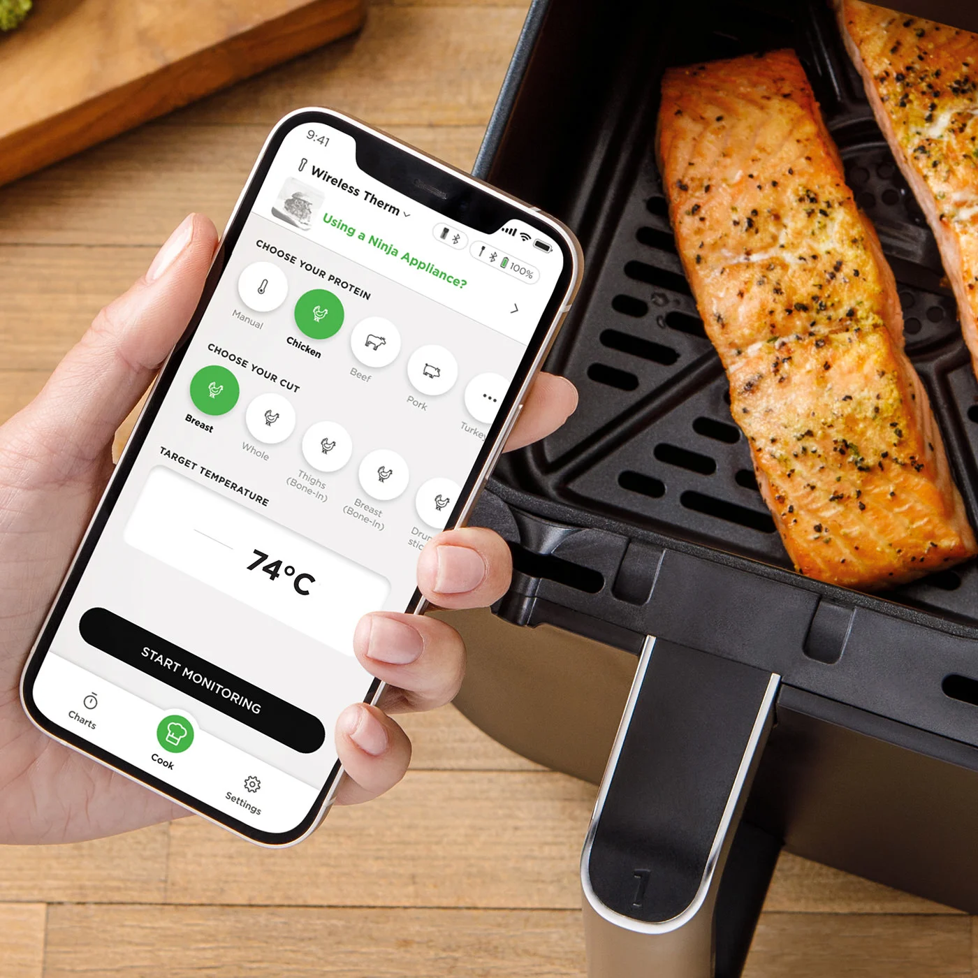 Ninja-WP100UK-InUse-Kitchen-OnIsland-ServingFood-Woman-RGB_copy3